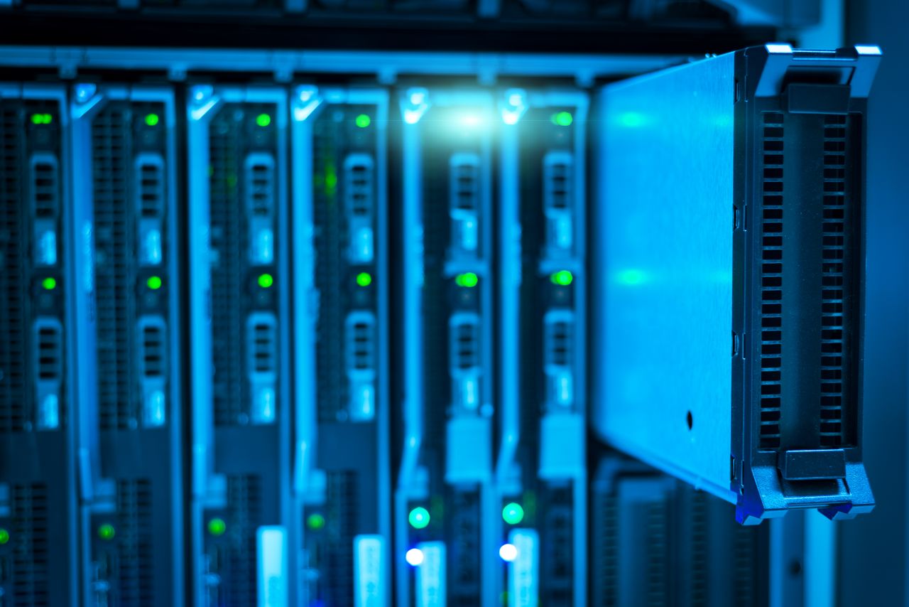 Offerings Detailed view of a server rack with a focus on technology and data storage.